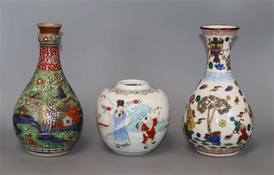 An 18th century Chinese clobbered guglet and two famille rose vases